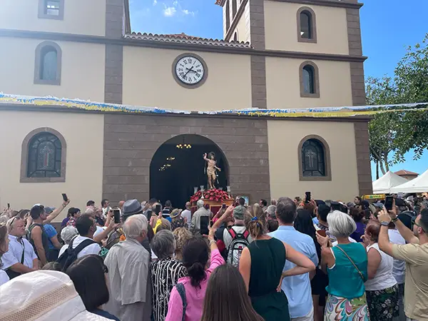 The statue being put back in the church