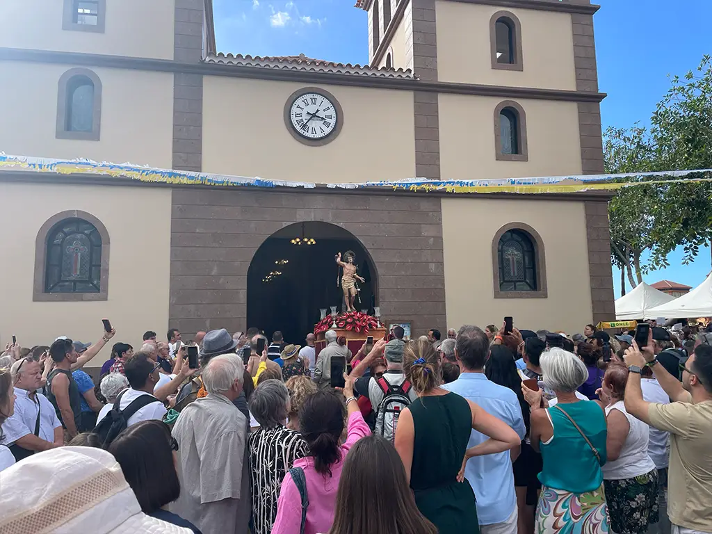 The statue being put back in the church