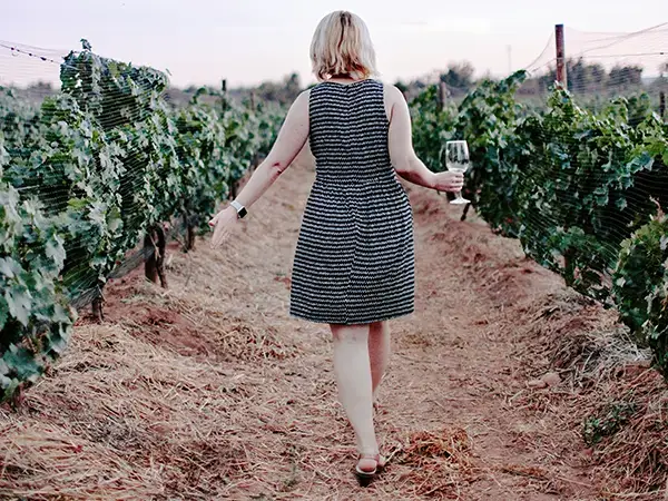 A tipsy tourist in our group explores the vineyards of Tenerife for the first time