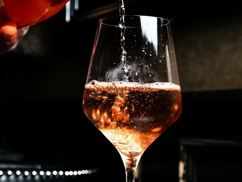 Canarian pink wine being poured at the Tegueste wine fair