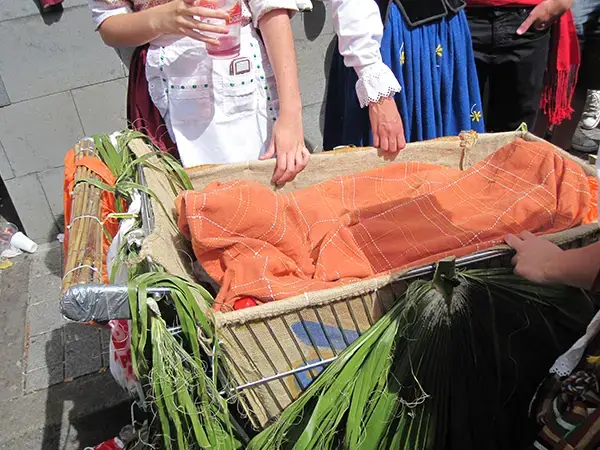 Boot leg chariots filled with booze hehe. The locals enjoy a bit of drinking at the Romeria of San Marcos in Tegueste.  Photo from https://www.flickr.com/photos/petezin/