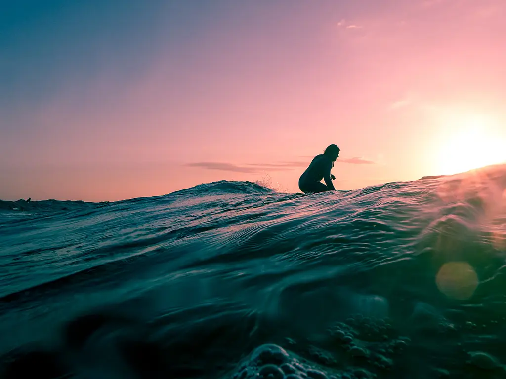 Taking off on big waves in Punta de Hidalgo.