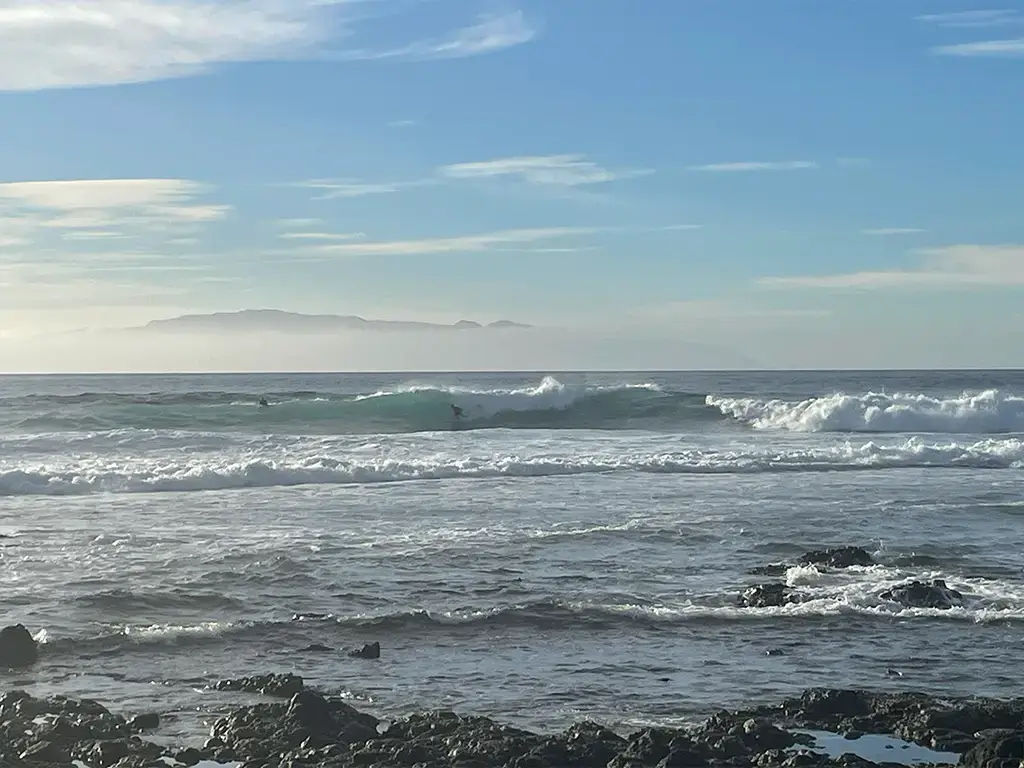 This is El Dedo, the rock finger. Very shallow bank here, never dive head first, instead try to land over the foam ball as you exit the wave,